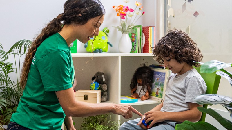 Caseworker providing a safe space for a child to talk and play